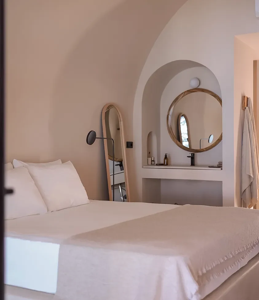 GAIA By The Sea — Bed and mirror detail