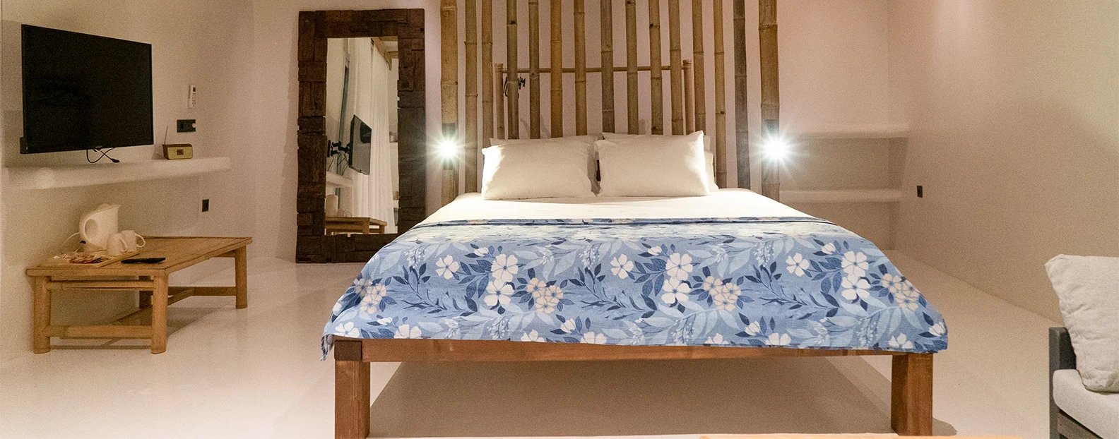 Bed and seating area in a premium room