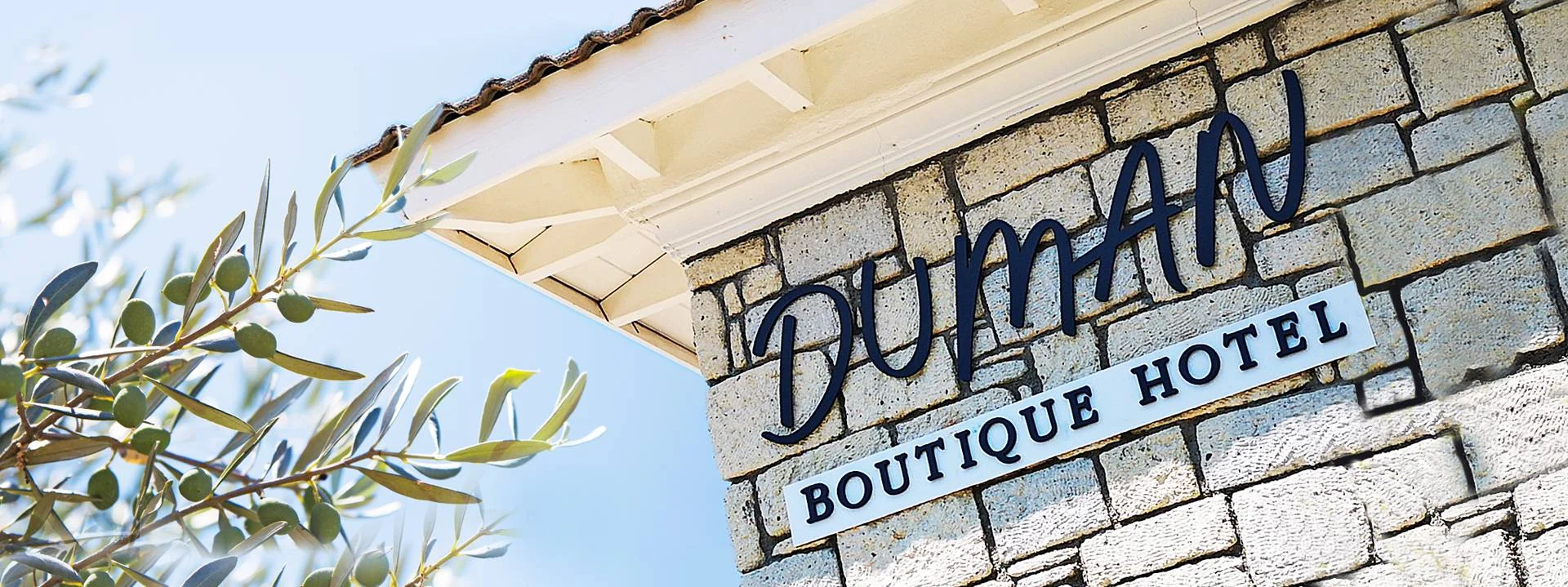 Duman Butik Otel — Hotel entrance sign