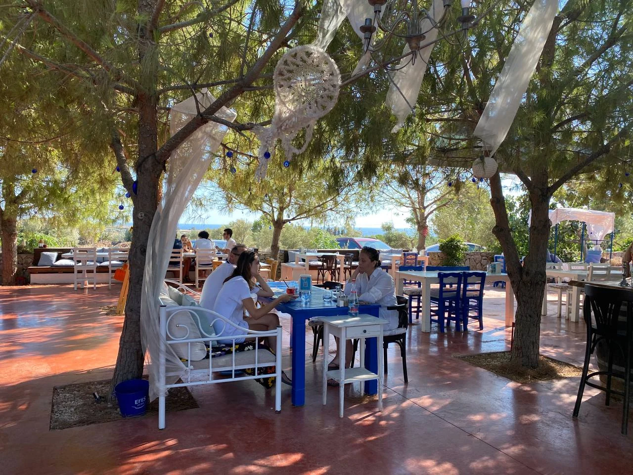 Noni’s House — Blue garden tables and chairs